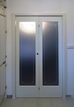 Skládací dveře do zárubně Kasard matné sklo